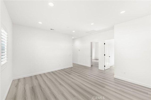 1359 Point Loma Pl, Walnut, CA 91789 - unfurnished room with light wood-style floors, recessed lighting, and attic access