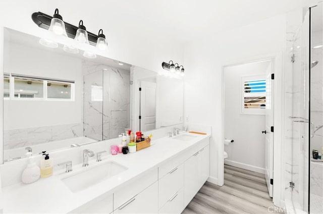 1359 Point Loma Pl, Walnut, CA 91789 - bathroom with a marble finish shower, double vanity, and wood finished floors
