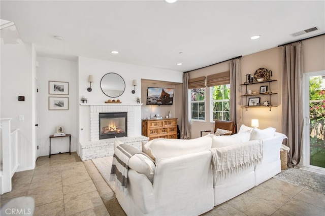 36287 Grazia Way, Winchester, CA 92596 - living room featuring a fireplace and recessed lighting