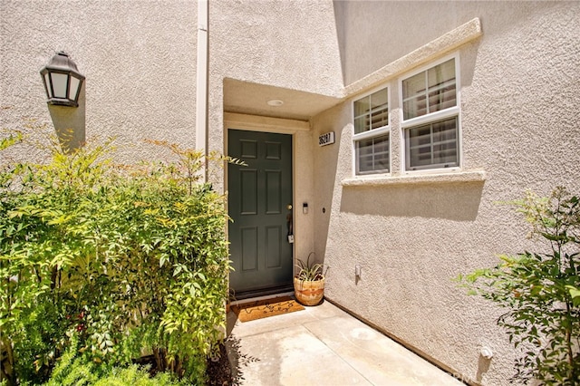 36287 Grazia Way, Winchester, CA 92596 - view of exterior entry featuring stucco siding