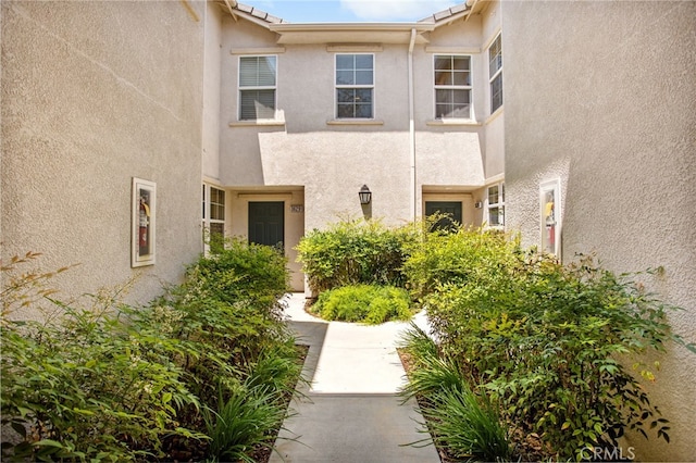 36287 Grazia Way, Winchester, CA 92596 - property entrance with stucco siding