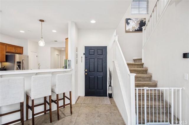 36287 Grazia Way, Winchester, CA 92596 - foyer with recessed lighting, stairway, and light tile patterned floors
