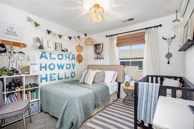 36287 Grazia Way, Winchester, CA 92596 - bedroom featuring a chandelier