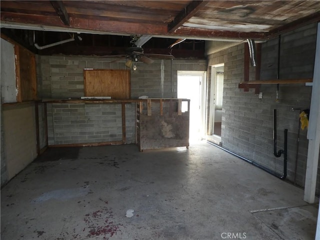 5528 San Onofre Ter, San Diego, CA 92114 - basement featuring a ceiling fan and concrete block wall