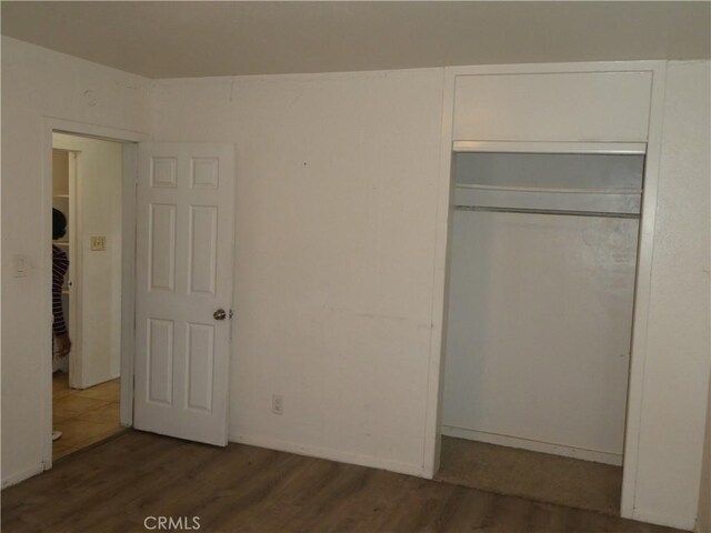 5528 San Onofre Ter, San Diego, CA 92114 - unfurnished bedroom featuring wood finished floors and a closet