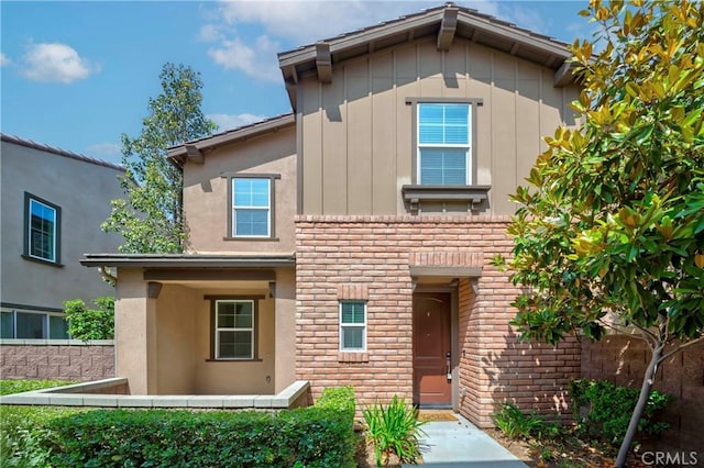8708 Celebration St, Chino, CA 91708 - view of front facade with board and batten siding and brick siding