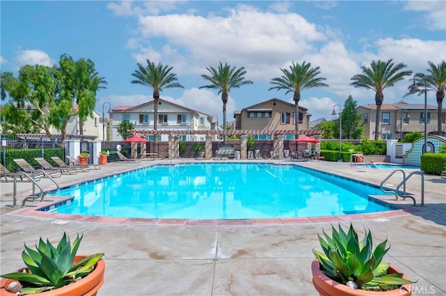 8708 Celebration St, Chino, CA 91708 - community pool with a patio area and a residential view