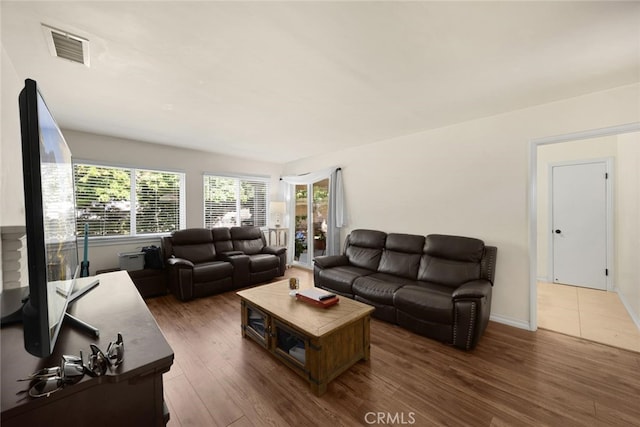 1344 S Douglas St, Santa Ana, CA 92704 - living room featuring wood finished floors