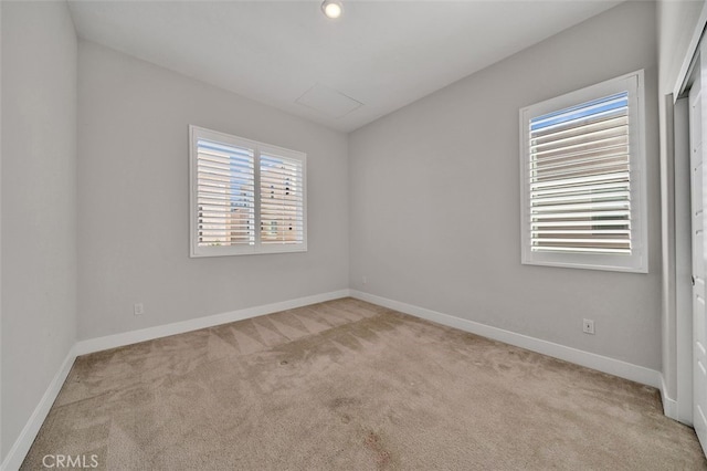 319 Sawbuck, Irvine, CA 92618 - carpeted spare room featuring baseboards