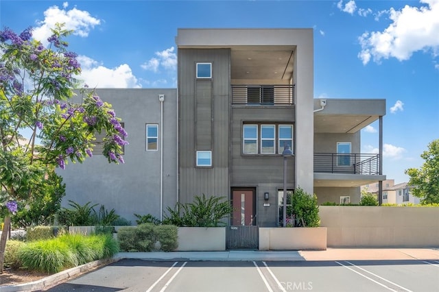 319 Sawbuck, Irvine, CA 92618 - view of property featuring uncovered parking
