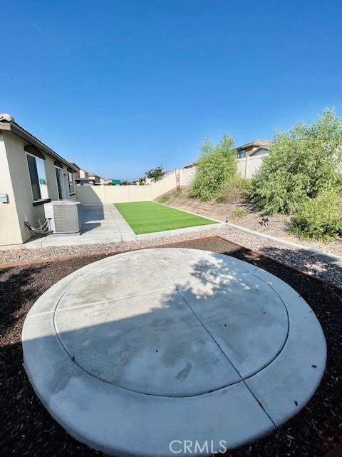 24612 Hero Cir, Menifee, CA 92584 - fenced backyard featuring a patio