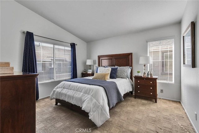 3434 E Lambeth Ct Unit F, Orange, CA 92869 - bedroom featuring multiple windows, light colored carpet, and vaulted ceiling
