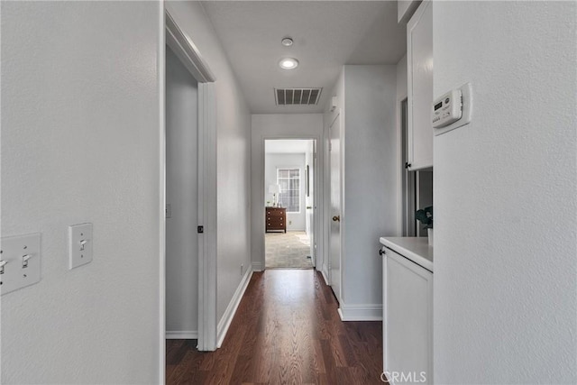 3434 E Lambeth Ct Unit F, Orange, CA 92869 - hall featuring dark wood-style floors and baseboards
