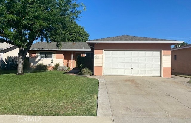 2313 Eucalyptus St, Atwater, CA 95301 - ranch-style house featuring a front lawn, concrete driveway, stucco siding, and a garage