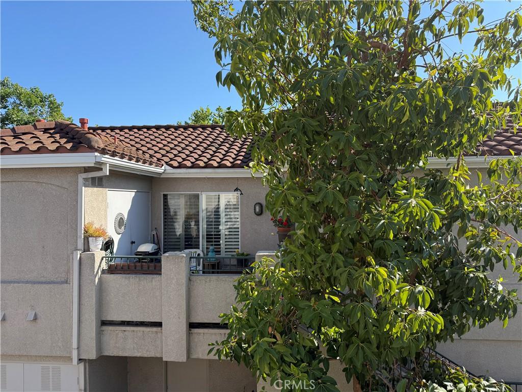 225 Cinnamon Teal, Aliso Viejo, CA 92656 - view of side of home with a tiled roof