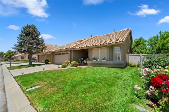 5129 W Pinehurst Dr, Banning, CA 92220 - ranch-style home with an attached garage, a tile roof, stucco siding, and driveway