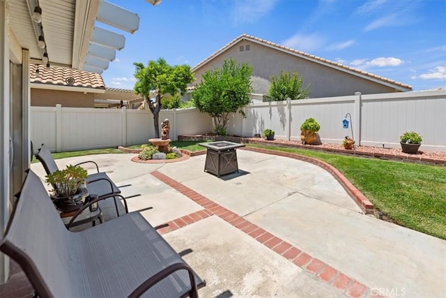 5129 W Pinehurst Dr, Banning, CA 92220 - fenced backyard featuring a patio area and an outdoor fire pit