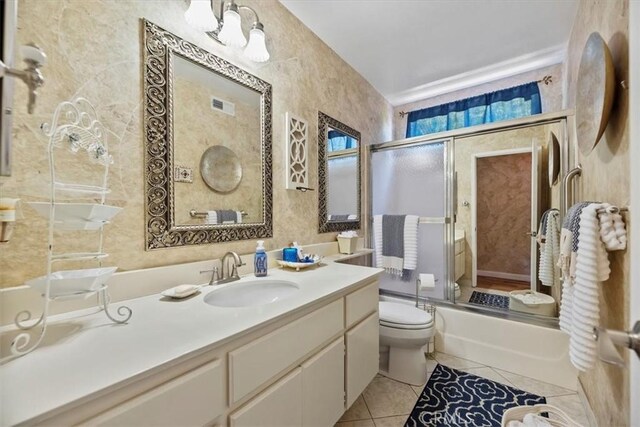 5129 W Pinehurst Dr, Banning, CA 92220 - bathroom featuring shower / bath combination with glass door, tile patterned flooring, and vanity