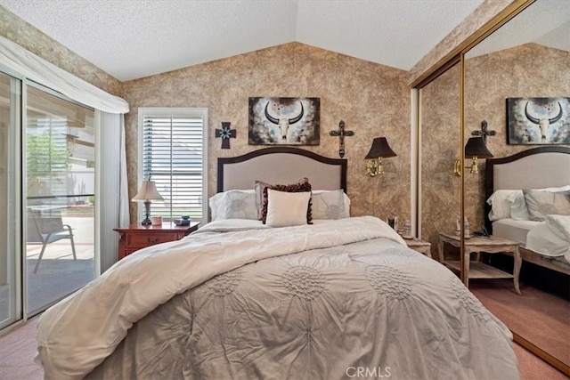 5129 W Pinehurst Dr, Banning, CA 92220 - bedroom with vaulted ceiling, access to outside, carpet floors, a textured ceiling, and a closet