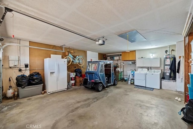 5129 W Pinehurst Dr, Banning, CA 92220 - garage with white refrigerator with ice dispenser, water heater, independent washer and dryer, and a garage door opener
