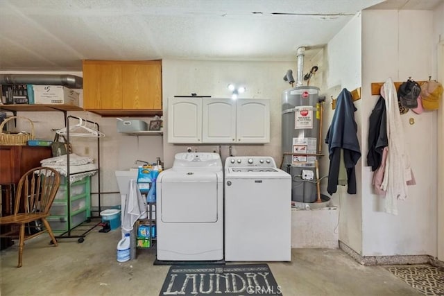 5129 W Pinehurst Dr, Banning, CA 92220 - washroom featuring strapped water heater, independent washer and dryer, and cabinet space