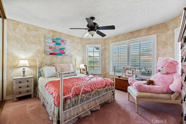5129 W Pinehurst Dr, Banning, CA 92220 - carpeted bedroom with a textured ceiling and ceiling fan