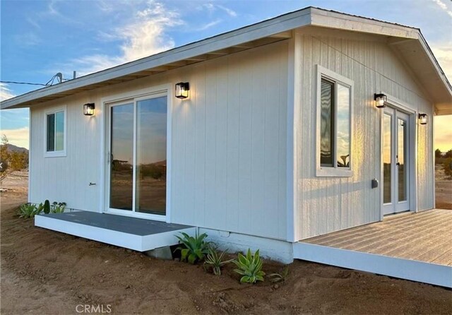 55354 El Lobo Rd, Landers, CA 92285 - view of home's exterior with a wooden deck and french doors