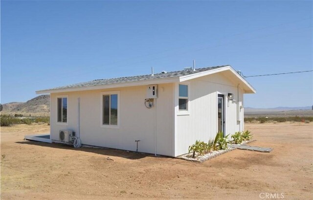55354 El Lobo Rd, Landers, CA 92285 - rear view of house with a mountain view