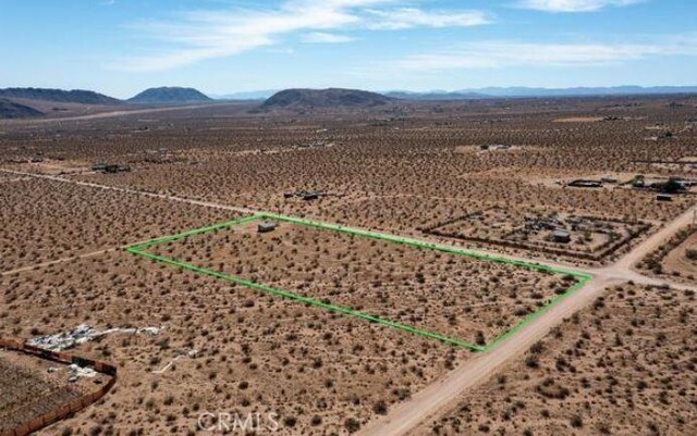 55354 El Lobo Rd, Landers, CA 92285 - view of rural area with mountains and property parcel outlined