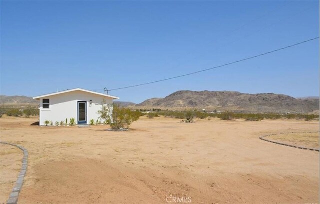 55354 El Lobo Rd, Landers, CA 92285 - view of yard featuring a mountain view and a rural view