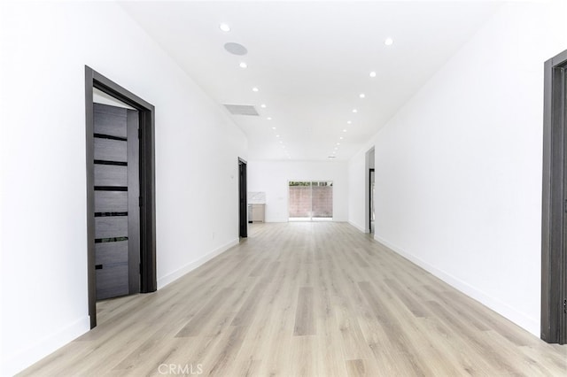 15009 Wyandotte St, Van Nuys, CA 91405 - empty room featuring recessed lighting and light wood-style flooring