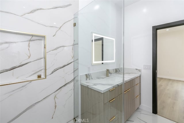 15009 Wyandotte St, Van Nuys, CA 91405 - bathroom with vanity and baseboards