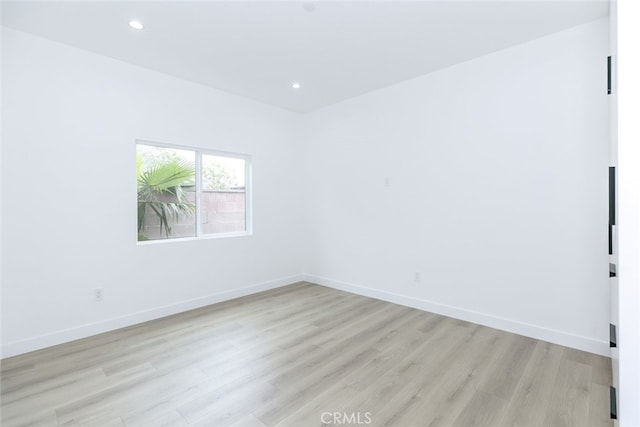 15009 Wyandotte St, Van Nuys, CA 91405 - empty room featuring light wood-type flooring and recessed lighting