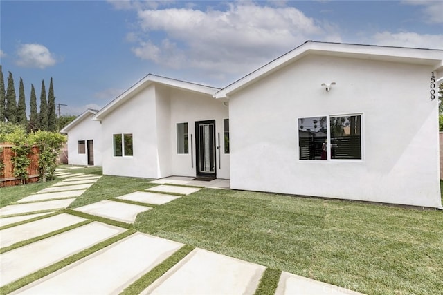 15009 Wyandotte St, Van Nuys, CA 91405 - rear view of house featuring stucco siding