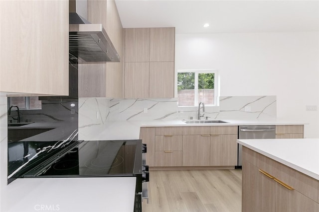 15009 Wyandotte St, Van Nuys, CA 91405 - kitchen featuring light brown cabinets, wall chimney range hood, modern cabinets, and light countertops