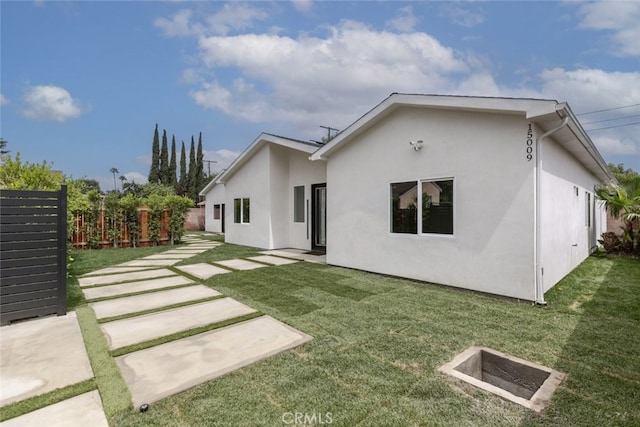 15009 Wyandotte St, Van Nuys, CA 91405 - back of house featuring stucco siding