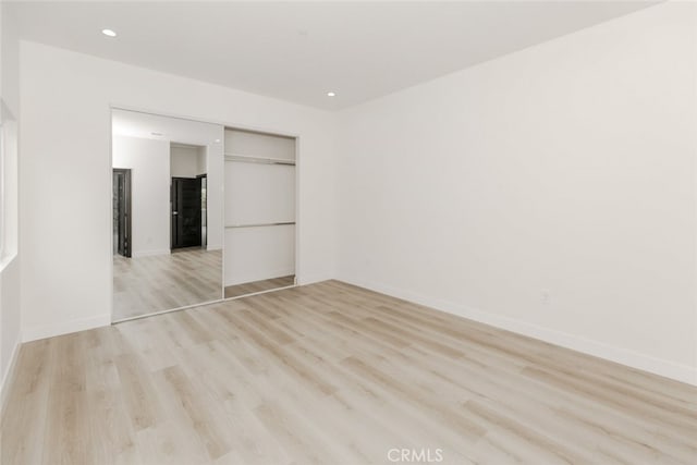 15009 Wyandotte St, Van Nuys, CA 91405 - unfurnished bedroom with light wood-style flooring, a closet, and recessed lighting