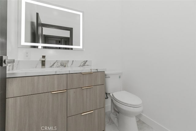 15009 Wyandotte St, Van Nuys, CA 91405 - bathroom featuring marble look tile flooring and vanity