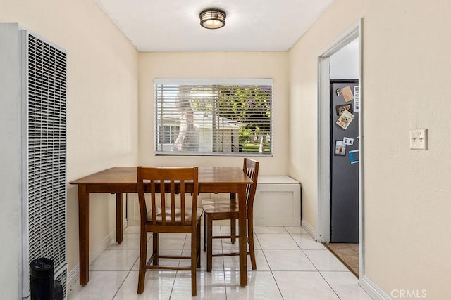 23277 Maribel Ave, Carson, CA 90745 - dining space with a heating unit and light tile patterned flooring