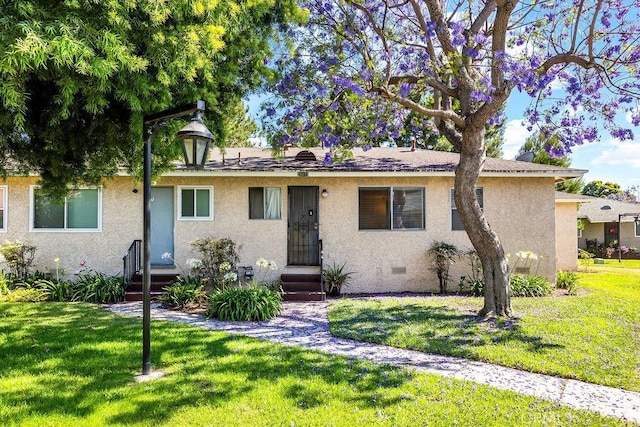 23277 Maribel Ave, Carson, CA 90745 - ranch-style house with entry steps, stucco siding, and a front yard