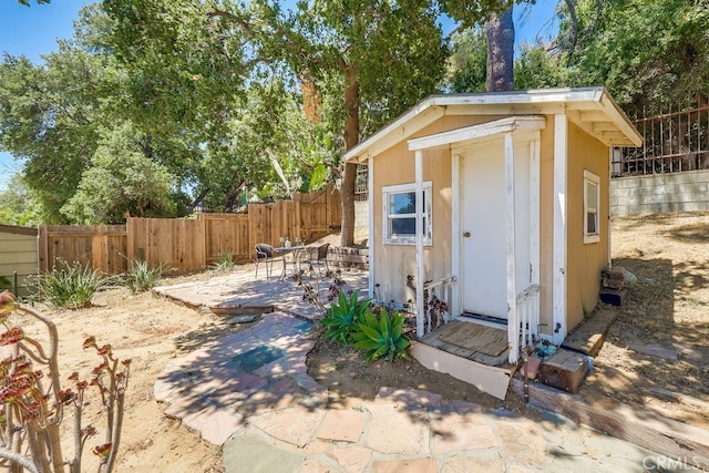 9733 Kentland Ave, Chatsworth, CA 91311 - view of shed with a fenced backyard