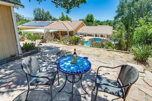 9733 Kentland Ave, Chatsworth, CA 91311 - view of patio / terrace with outdoor dining area and an outdoor pool