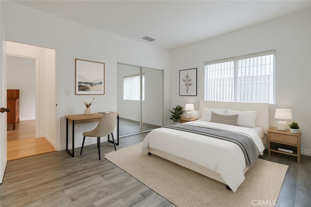 9733 Kentland Ave, Chatsworth, CA 91311 - bedroom featuring a closet and light wood finished floors