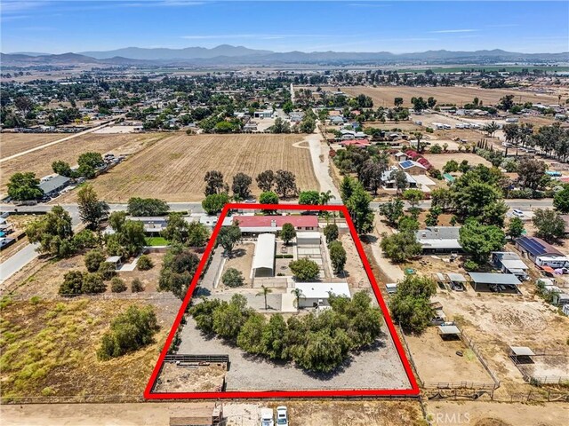25270 Tradewinds Dr, Menifee, CA 92585 - aerial view of property's location featuring property parcel outlined and a mountainous background