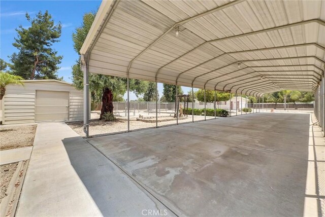 25270 Tradewinds Dr, Menifee, CA 92585 - view of parking with a detached carport