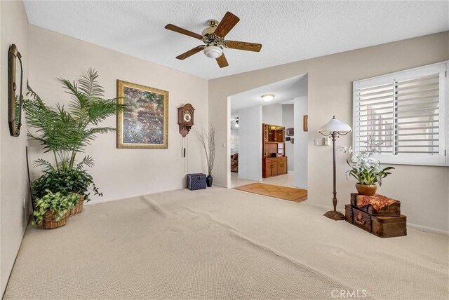 25270 Tradewinds Dr, Menifee, CA 92585 - unfurnished room featuring carpet, ceiling fan, and a textured ceiling