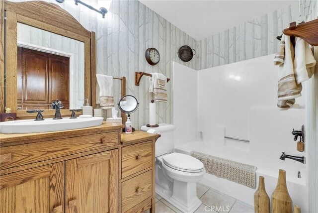 25270 Tradewinds Dr, Menifee, CA 92585 - full bath with vanity, tile patterned floors, and  shower combination