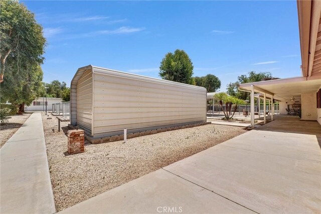 25270 Tradewinds Dr, Menifee, CA 92585 - surrounding community with a patio
