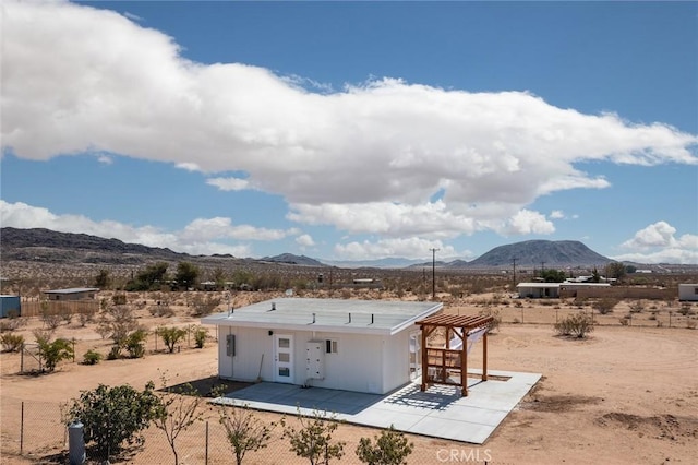 2250 Delgada Ave, Landers, CA 92285 - view of patio / terrace featuring a mountain view, view of desert landscape, and a view of rural / pastoral area