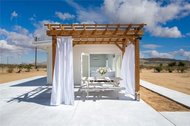 2250 Delgada Ave, Landers, CA 92285 - view of patio featuring a pergola